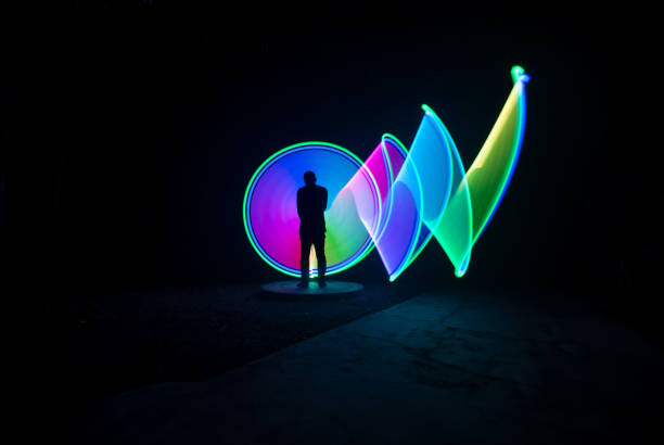 istock People with beautiful light painting artwork 1306750883