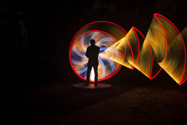 istock People with beautiful light painting artwork 1306750887