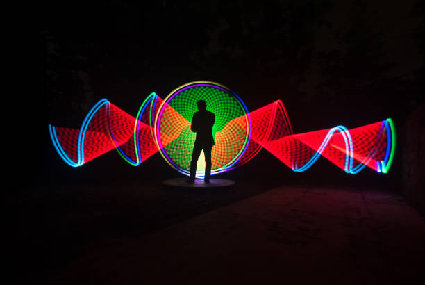 istock People with beautiful light painting artwork 1306750917
