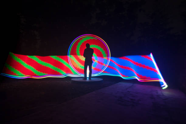 istock People with beautiful light painting artwork 1306750945