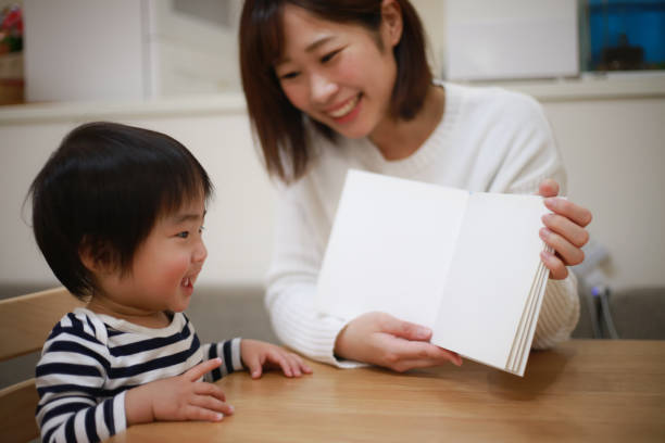 istock Parents and children reading 1306759495