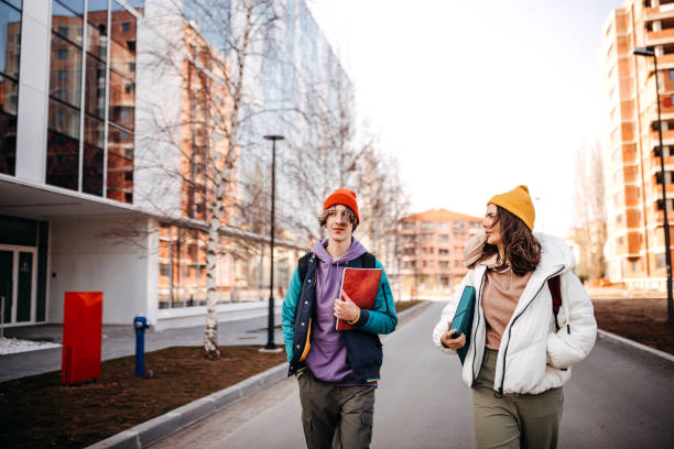 istock Friends going to school together 1306759700