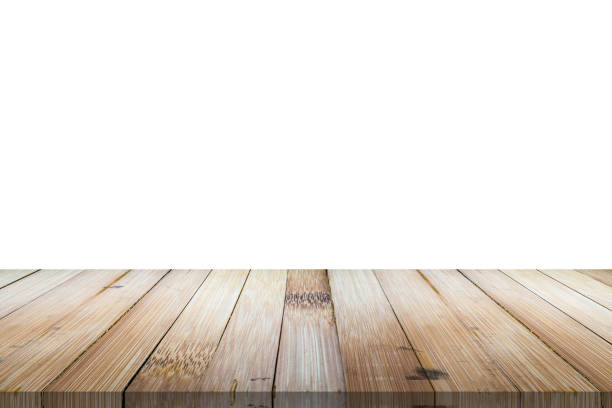 istock Empty bamboo wood table top isolated on white background for product display montage 1306762616