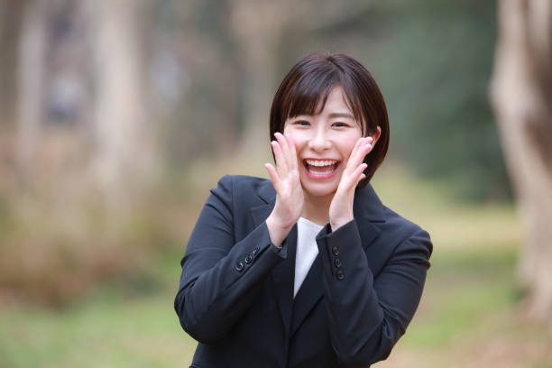 istock Female employees cheering 1306764359