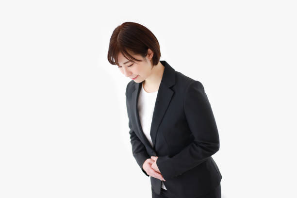 istock Female employee bowing 1306766986