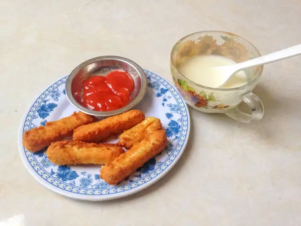 Simple Home Snack Foods Chicken Nuggets, Sauce And A Cup Of Milk