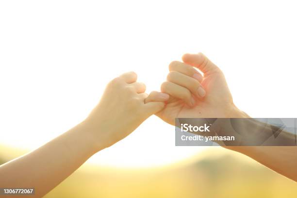 Pinky Swear Stock Photo - Download Image Now - Pinky Promise, Little Finger, Love - Emotion