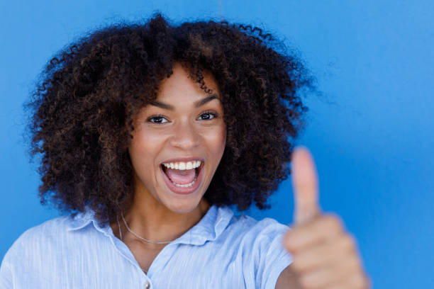 istock Happy, Smiling Young African Woman 1306774733