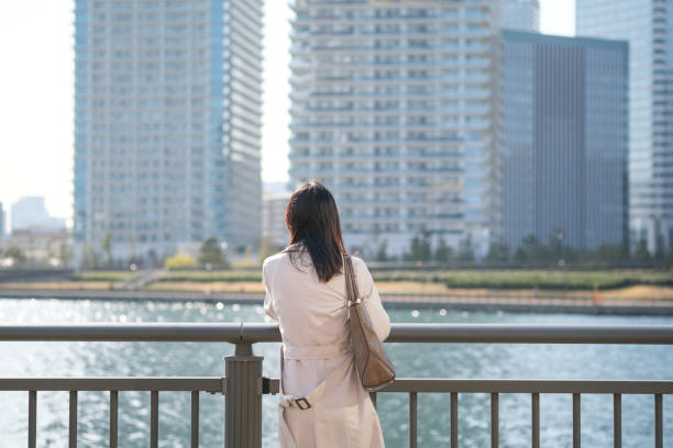 istock Rear view of woman looking at view 1306775690