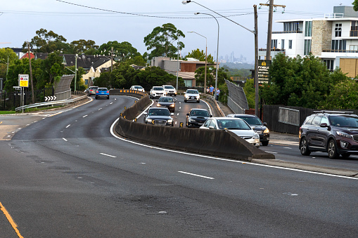 Friday traffic on Pacific Highway in Sydney suburb. Pymble, NSW, Australia. 5 March 2021.