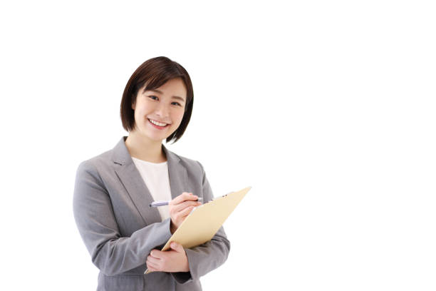 istock Female employee with binder 1306778895