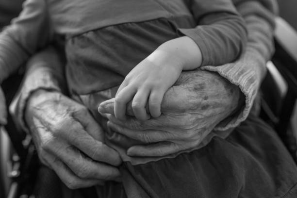 Moments with Great Grandma. A little girl holding the hand of her Great Grandma. i love you photos stock pictures, royalty-free photos & images