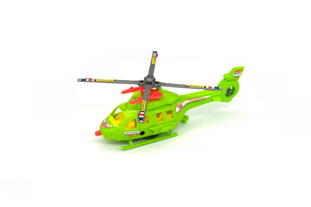 istock Plastic toy helicopter isolated on white background. 1306791734