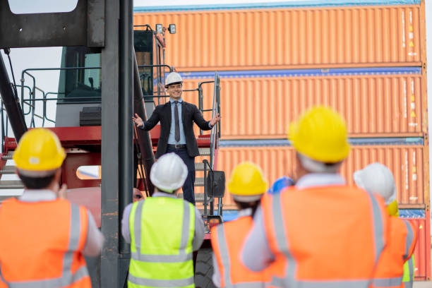 istock Worker team meeting and training, Logistics and transportation business Containers import concept, Work successful. 1306791796