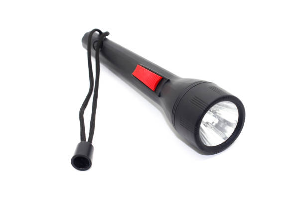 istock Black Electric LED torch flashlight isolated on a white background 1306792756
