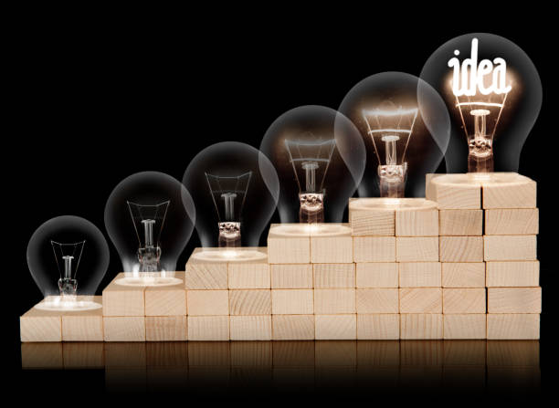istock Dark and Shining Light Bulbs with Idea Concept 1306795966