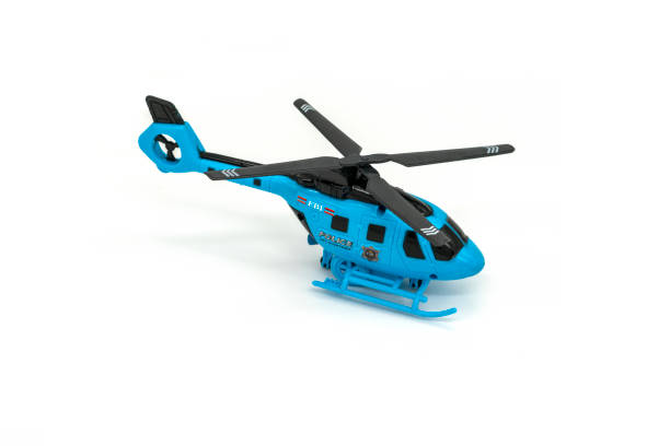 istock Plastic toy helicopter isolated on white background. 1306797593