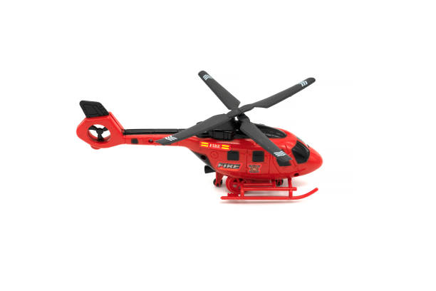 istock Plastic toy helicopter isolated on white background. 1306797596