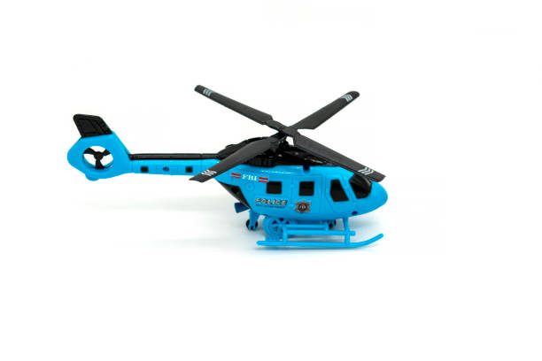 istock Plastic toy helicopter isolated on white background. 1306797617