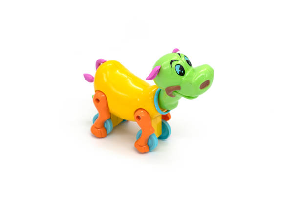 istock Isolated plastic cow toy photo on white background. 1306798692