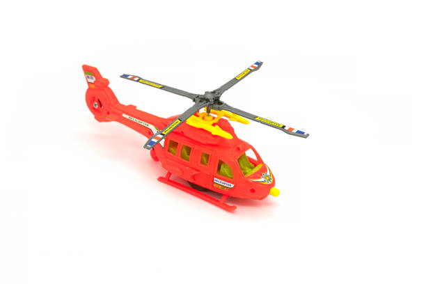 istock Plastic toy helicopter isolated on white background. 1306799240