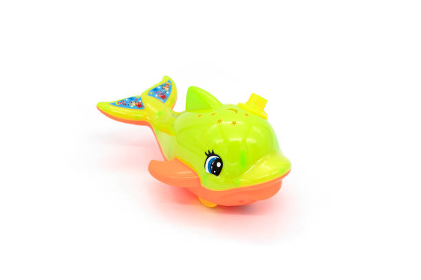 istock Dolphin toy Isolated on white background 1306799311