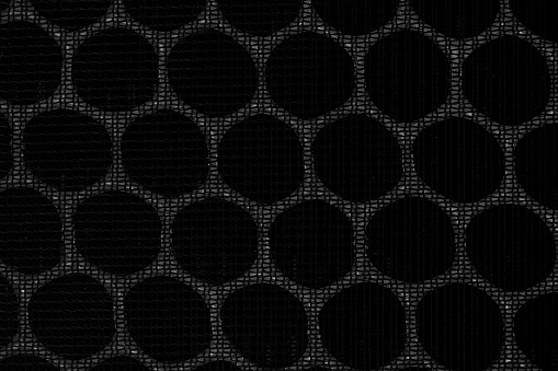 Closeup of HEPA filter. Black cells background
