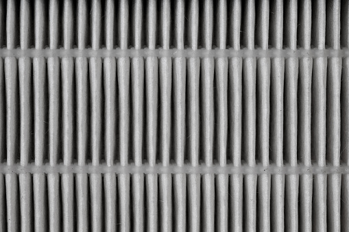Closeup of HEPA filter. White stripped background