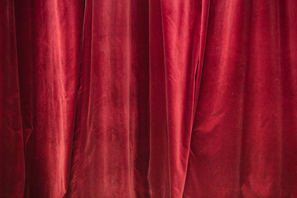 istock Red curtain in theatre. 1306801366