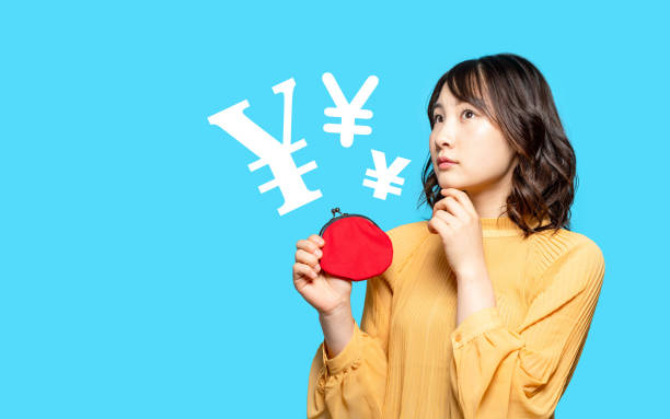 istock Young asian girl holding a wallet. 1306802225