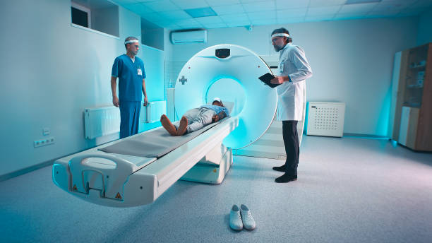 istock Doctors making CT scan of black patient 1306802674