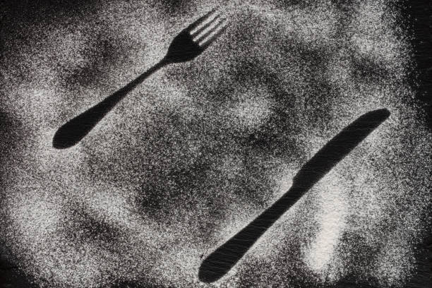 istock fork and knife silhouette made with flour 1306803426