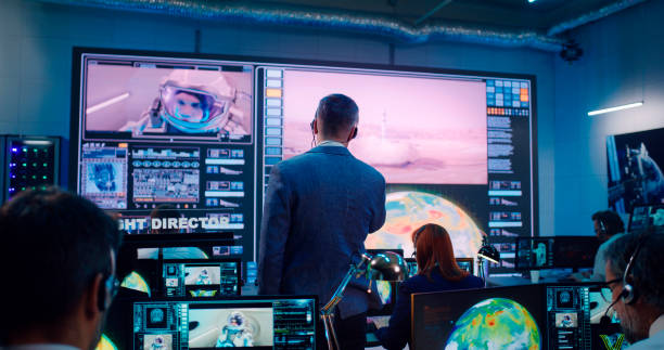 istock Boss and team launching spacecraft in office 1306803492