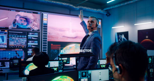 istock Boss and team launching spacecraft in office 1306803499