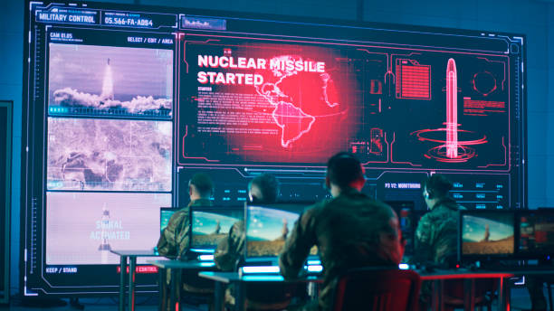 istock Unrecognizable military men launching nuclear missile 1306804022