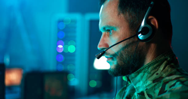 istock Military man giving commands in control center 1306804040