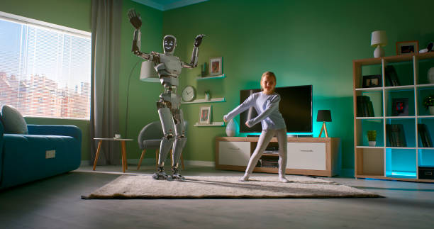 Girl dancing with android friend at home Full body girl dancing with energetic robotic friend on weekend day at home in future real time stock pictures, royalty-free photos & images