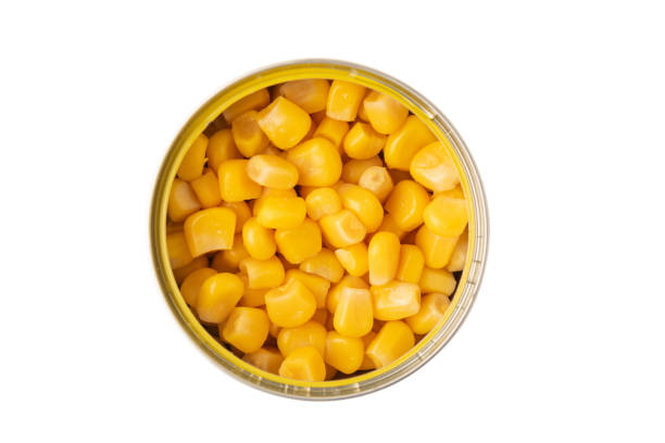 istock canned corn in a jar isolated on white background, top view 1306805216