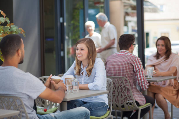 istock People in a street caffe 1306813743
