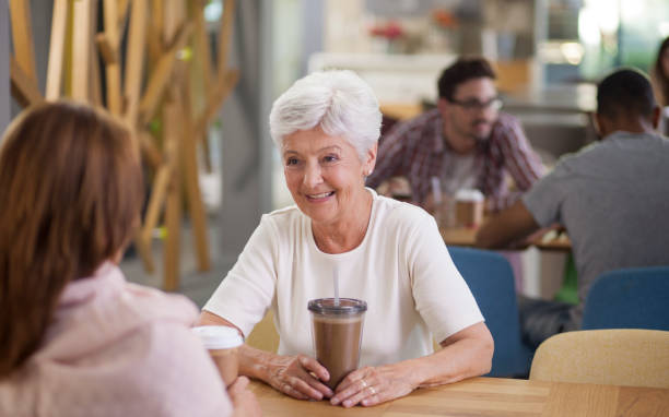 istock Senior woman in caffee shop 1306813777