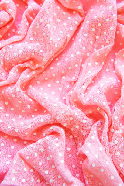 istock Polka dot pink and white fabric 1306815363