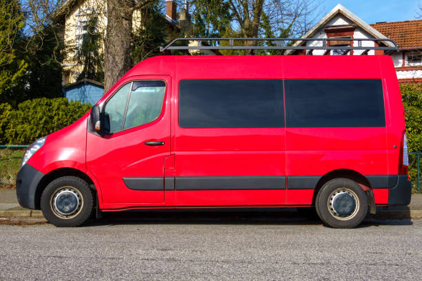 Red van on the way parking on the road