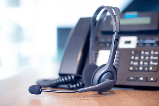 istock Communication support, call center and customer service help desk. VOIP headset for customer service support (call center) concept 1306821457