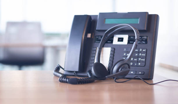 istock Communication support, call center and customer service help desk. VOIP headset for customer service support (call center) concept 1306821467