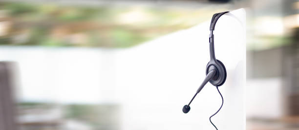 istock Communication support, call center and customer service help desk. VOIP headset for customer service support (call center) concept 1306821468