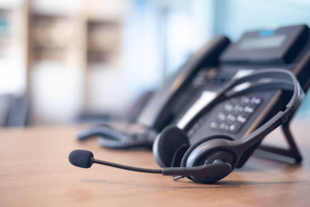 istock Communication support, call center and customer service help desk. VOIP headset for customer service support (call center) concept 1306821470