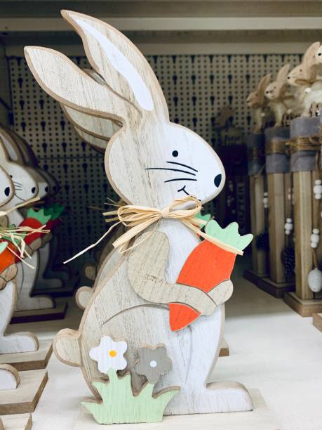 istock Easter wooden decoration with rabbits bunny 1306823769
