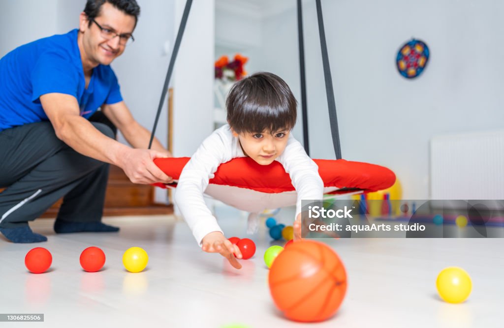 Occupational therapy treatment session on screening development of kids. Concept for pediatric clinic, pediatrician and learning.Pediatric Occupational Therapy Child Stock Photo