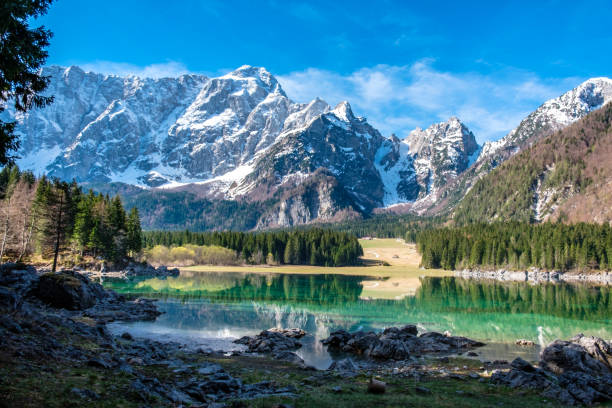 istock Spring morning at the alpine lake 1306826857