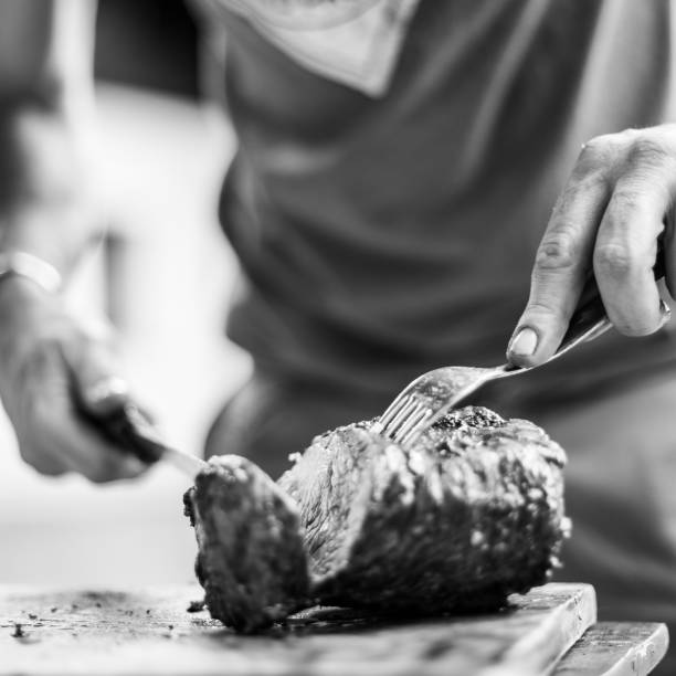 istock barbeque meat preparation in a summer day 1306827657